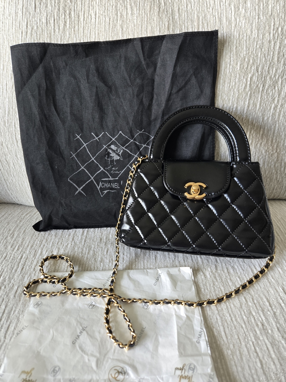 CHANEL Black Quilted Patent Leather Mini Top-Handle Bag with Gold Chain